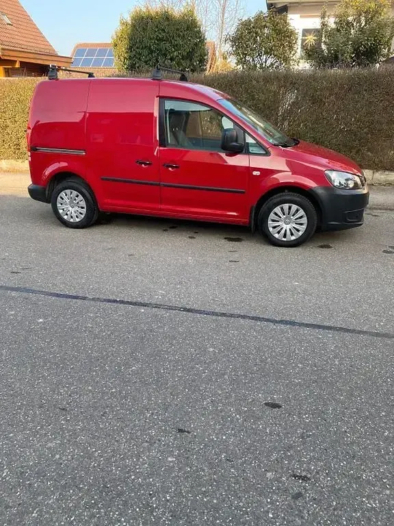 Second-hand VW Caddy 109 CP (80 kW) 2011 Negru Monovolum