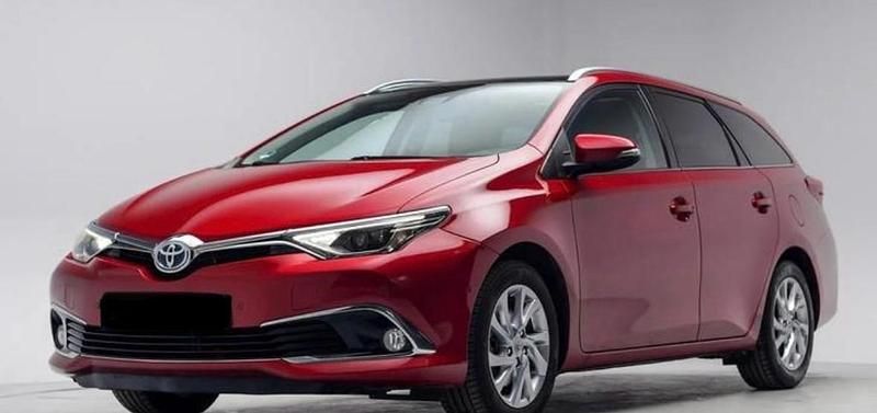 Gebraucht Toyota Auris Hybrid 130 PS (95 kW) 2015 Rot Kombi
