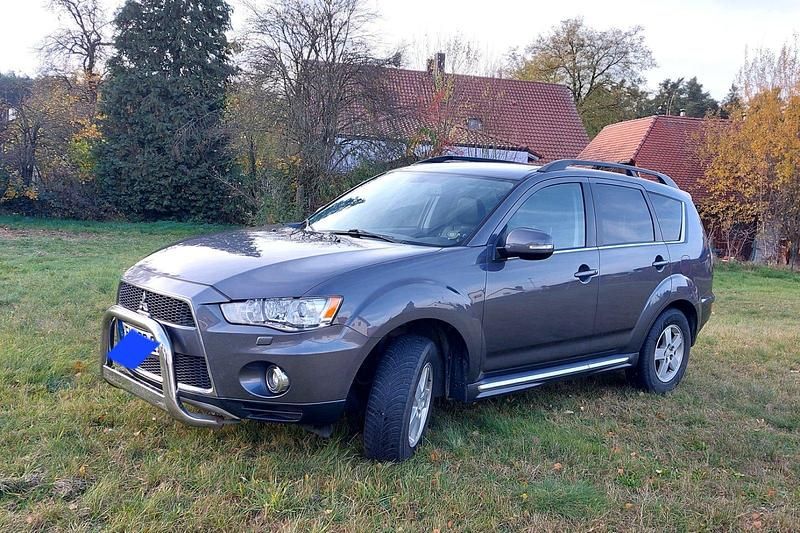 Grau Gebraucht 2012 Mitsubishi Outlander SUV | 4.200 € (Superpreis) - Bild 1/4