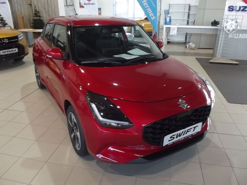 Rot Neu 2025 Suzuki Swift Comfort+ Limousine | 19.030 € - Bild 1/4