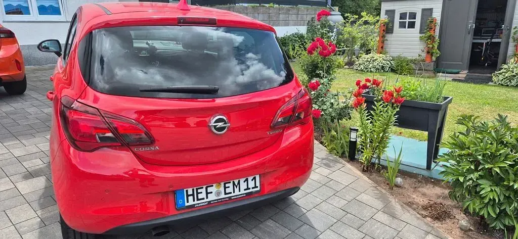 Gebraucht Opel Corsa Color Edition 101 PS (74 kW) 2015 Rot Kleinwagen