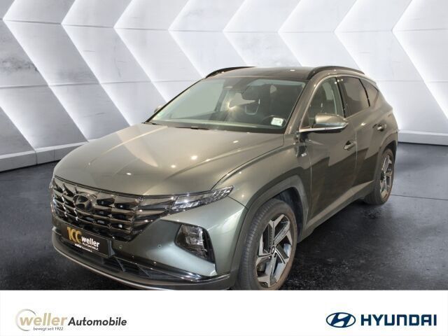 Grau Gebraucht 2021 Hyundai Tucson Prime SUV | 30.430 € (Etwas zu teuer) - Bild 1/4
