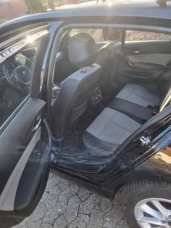 Second-hand BMW 120 142 CP (104 kW) 2012 Negru Hatchback