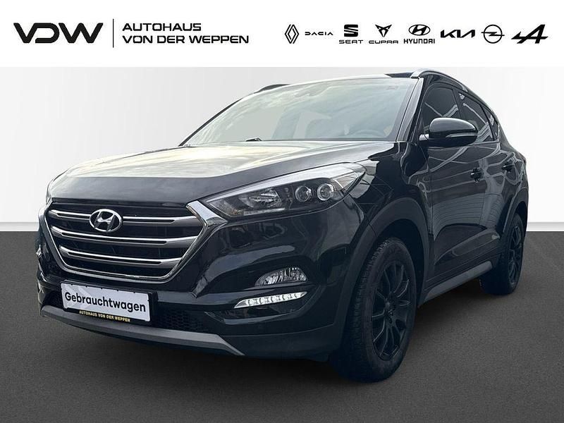 Schwarz Gebraucht 2018 Hyundai Tucson Passion Plus SUV | 16.880 € (Fairer Preis) - Bild 1/4