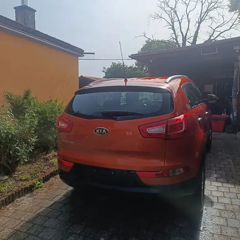 Gebraucht Kia Sportage Vision 163 PS (119 kW) 2012 Orange SUV
