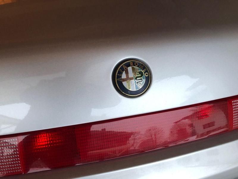 Second-hand Alfa Romeo Spider Lusso 150 CP (110 kW) 1997 Argintiu Cabrio