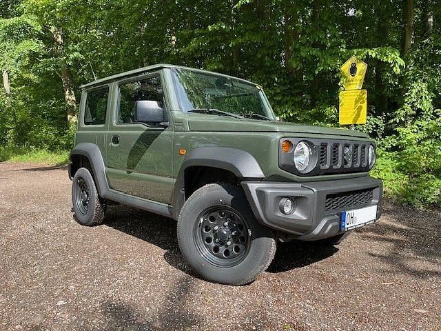 Grün Gebraucht 2024 Suzuki Jimny SUV | 34.500 € (Teuer) - Bild 1/4