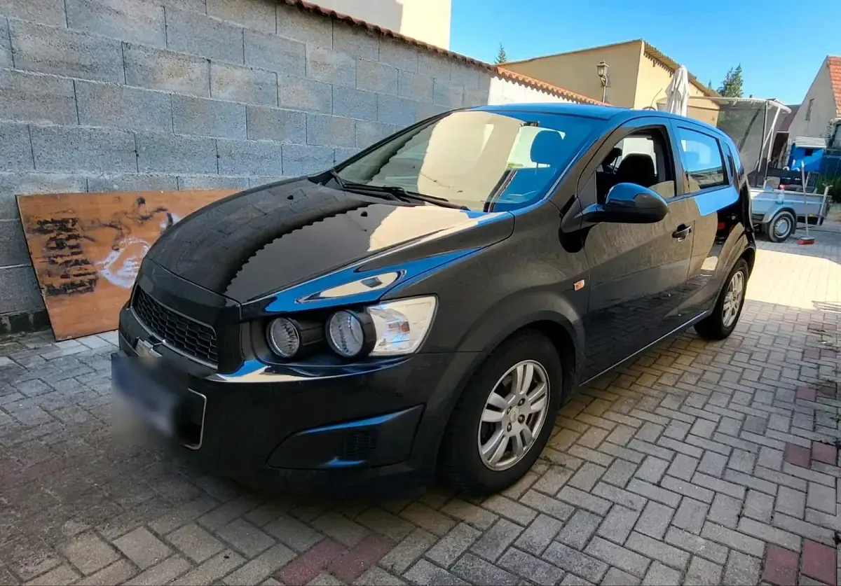 Gebraucht Chevrolet Aveo 101 PS (74 kW) 2012 Schwarz Kleinwagen
