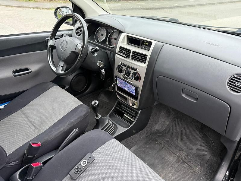 Gebraucht Daihatsu Cuore 58 PS (42 kW) 2006 Schwarz Kleinwagen