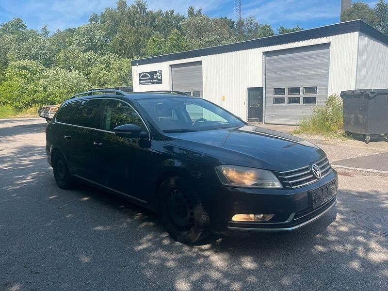 Second-hand VW Passat Highline 211 CP (155 kW) 2012 Negru Break