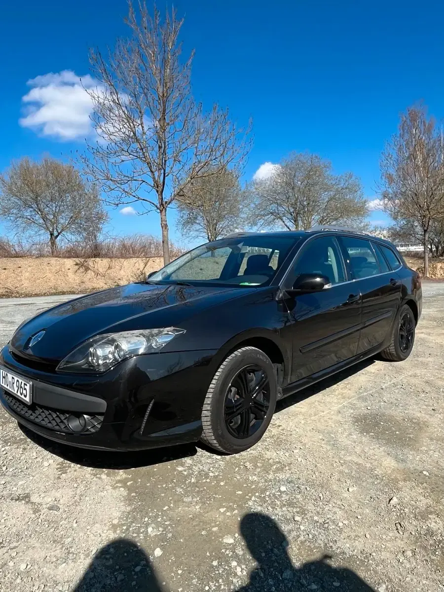 Używany Renault Laguna III 110 KM (80 kW) 2010 Czarny Sedan/Limuzyna