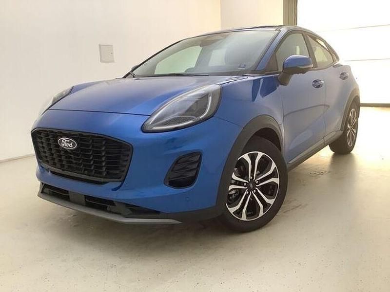 Dynamicblau metallic Gebraucht 2024 Ford Puma Gen-E Titanium SUV | 26.490 € - Bild 1/4