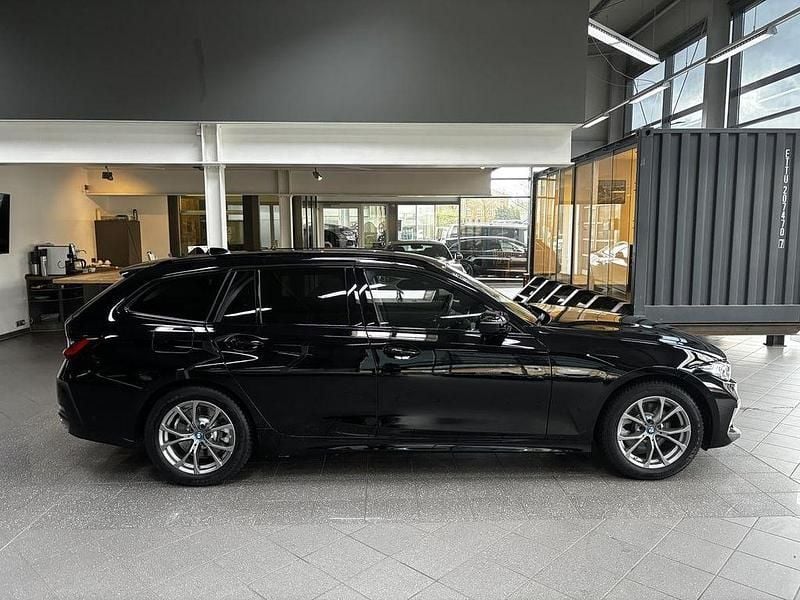 Gebraucht BMW 320e Sport Line 204 PS (150 kW) 2024 Schwarz Kombi