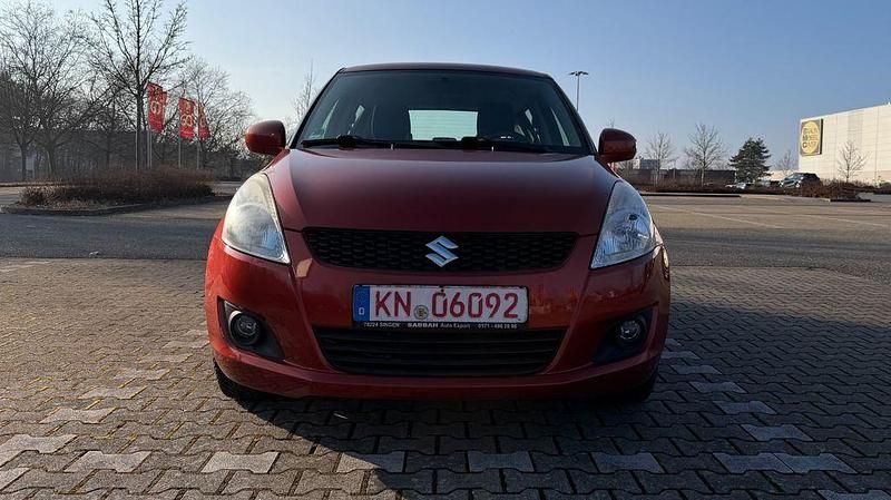 Gebraucht Suzuki Swift Club 94 PS (69 kW) 2011 Orange Kleinwagen