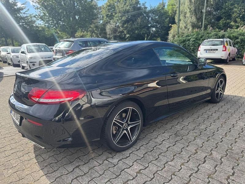 Schwarz Gebraucht 2017 Mercedes C250 AMG line Coupé | 22.999 € (Guter Preis) - Bild 1/4