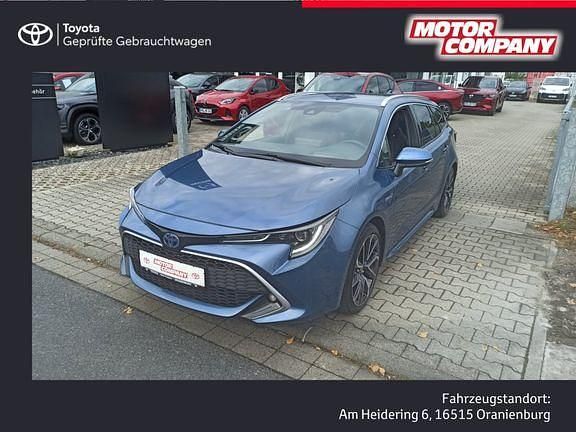 Denimblau metallic Gebraucht 2021 Toyota Corolla Lounge Kombi | 26.980 € (Etwas zu teuer) - Bild 1/4