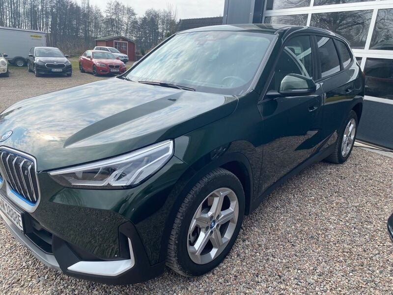 Sanremo green metallic Gebraucht 2023 BMW iX1 Comfort Edition SUV | 39.950 € (Guter Preis) - Bild 1/4