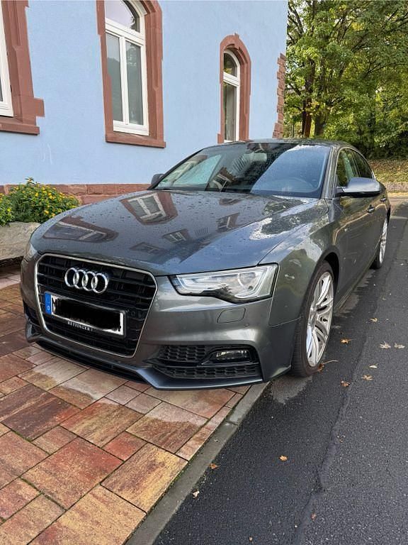 Grau Gebraucht 2015 Audi A5 Sportback S-Line Limousine | 16.500 € (Fairer Preis) - Bild 1/4
