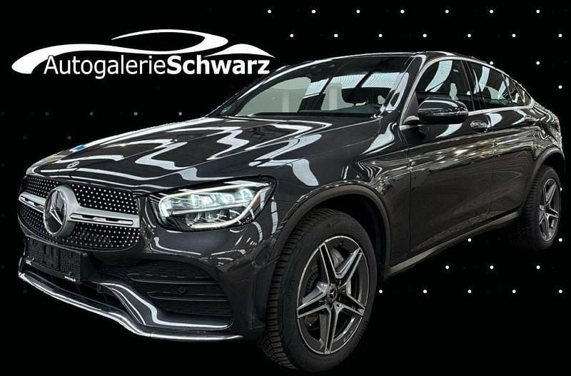 Sonderlackierung amg grafitgra Gebraucht 2021 Mercedes GLC300e AMG line Coupé | 41.890 € (Fairer Preis) - Bild 1/3