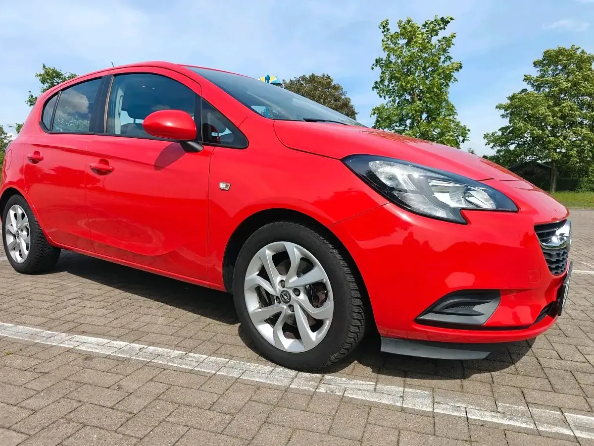 Używany Opel Corsa 90 KM (66 kW) 2016 Czerwony Hatchback