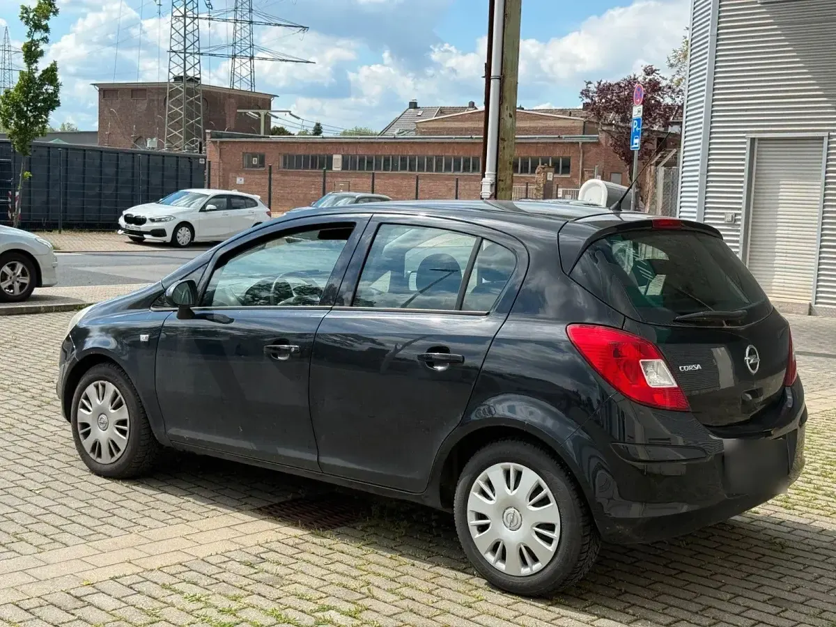 Gebraucht Opel Corsa Selection 86 PS (63 kW) 2011 Schwarz Kleinwagen