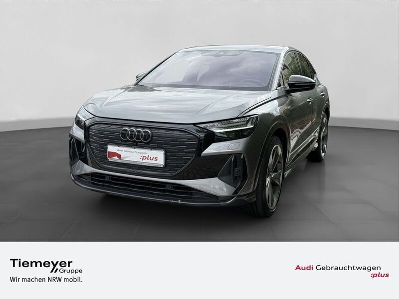 Grau Gebraucht 2022 Audi Q4 Sportback e-tron Sport SUV | 44.380 € (Teuer) - Bild 1/4