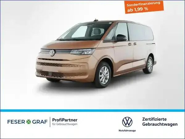 Copper bronze metallic Gebraucht 2024 VW Multivan Van / Kleinbus | 48.985 € (Superpreis) - Bild 1/1