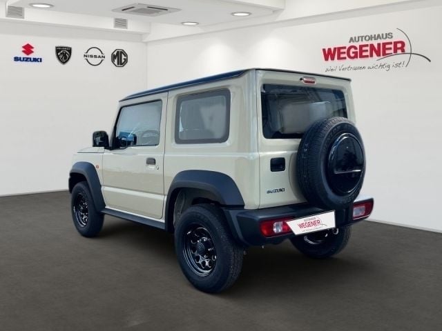 Gebraucht Suzuki Jimny Comfort 102 PS (75 kW) 2023 Chiffon/ bluish black pearl SUV