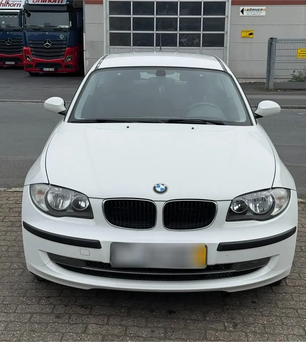 Używany BMW 116 122 KM (89 kW) 2008 Biały Hatchback