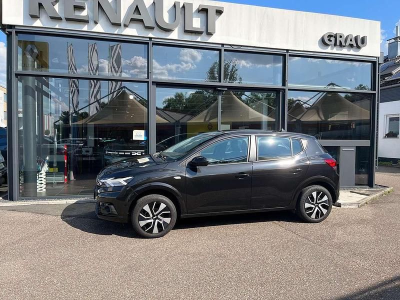 Perlmuttschwarz Gebraucht 2024 Dacia Sandero Expression Kleinwagen | 16.890 € (Fairer Preis) - Bild 1/4