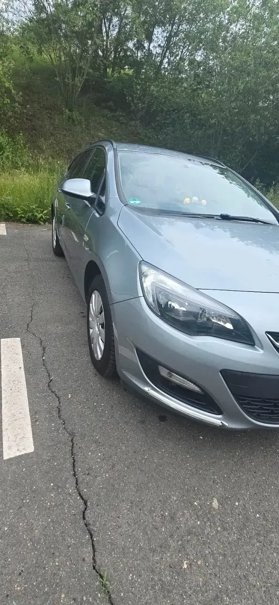 Gebraucht Opel Astra Sport 110 PS (80 kW) 2014 Grau Kombi