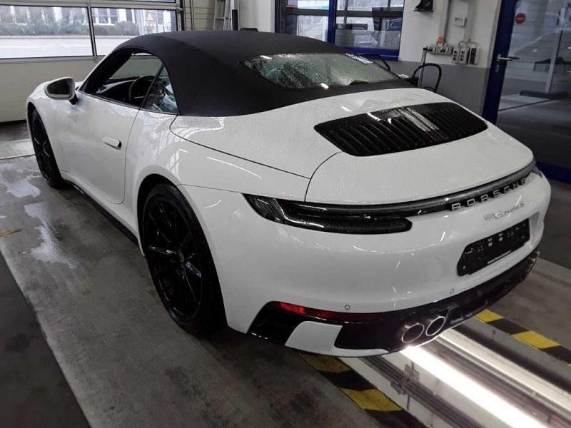 Gebraucht Porsche 992 450 PS (330 kW) 2021 Weiß carraraweißmetallic (metallic) Cabrio