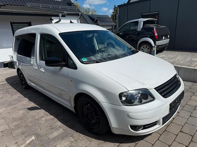 Second-hand VW Caddy Maxi 105 CP (77 kW) 2010 Alb Monovolum