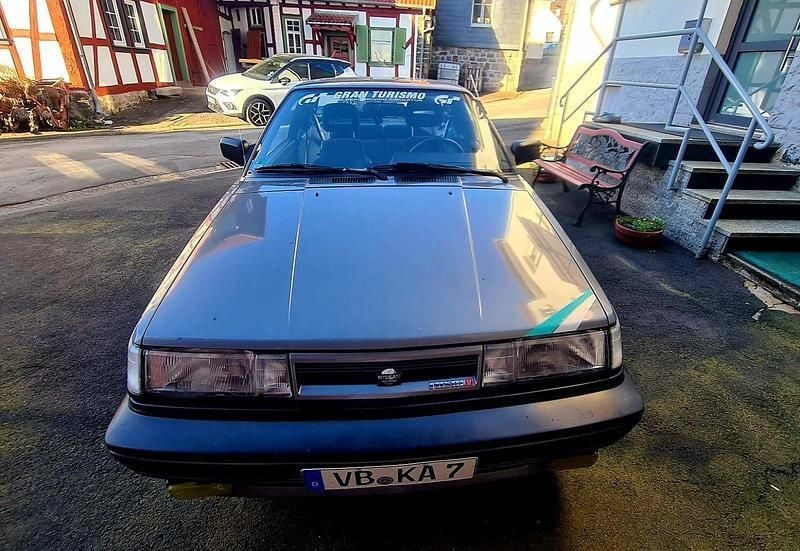 Grau Gebraucht 1990 Nissan Sunny Coupé | 4.450 € - Bild 1/4