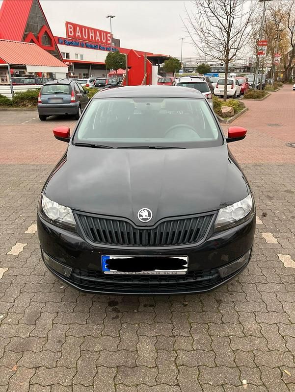 Używany Skoda Rapid 110 KM (80 kW) 2013 Czarny Hatchback