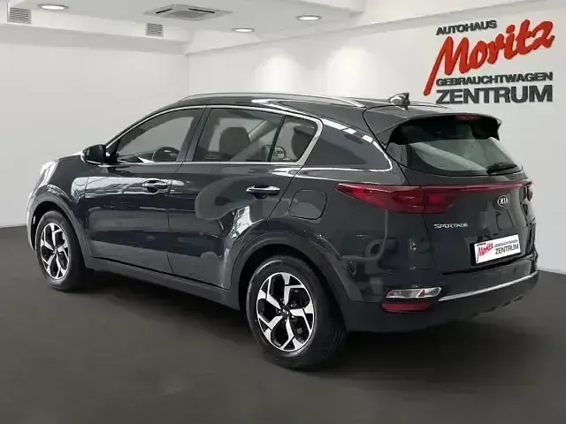 Gebraucht Kia Sportage Vision 177 PS (130 kW) 2020 H8g) pentametal met. (grau SUV