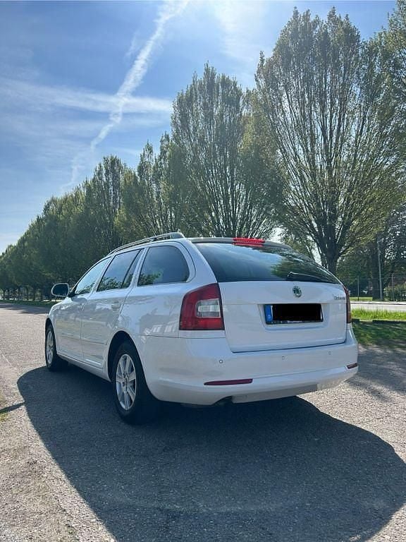 Second-hand Skoda Octavia Elegance 105 CP (77 kW) 2013 Alb Break