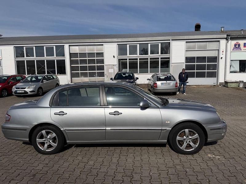 Gebraucht Kia Opirus 203 PS (149 kW) 2005 Silber Limousine