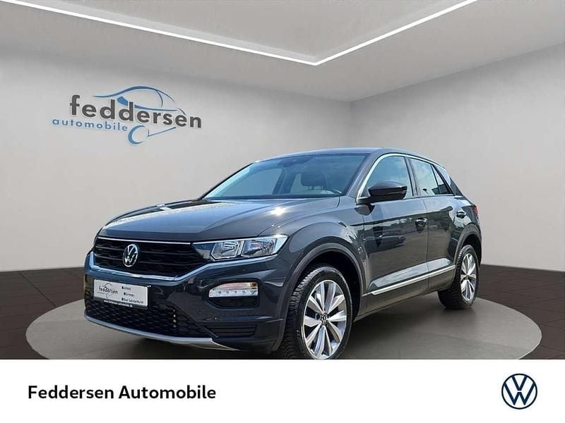 Uranograu (metallic) Gebraucht 2022 VW T-Roc Style SUV | 27.979 € (Guter Preis) - Bild 1/4