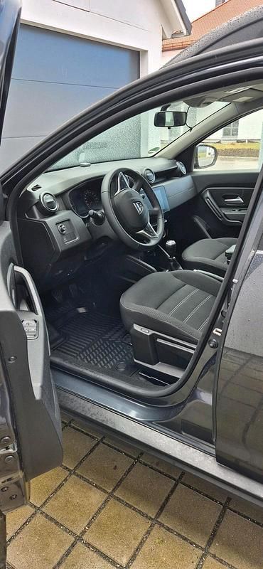 Gebraucht Dacia Duster 101 PS (74 kW) 2023 Grau SUV