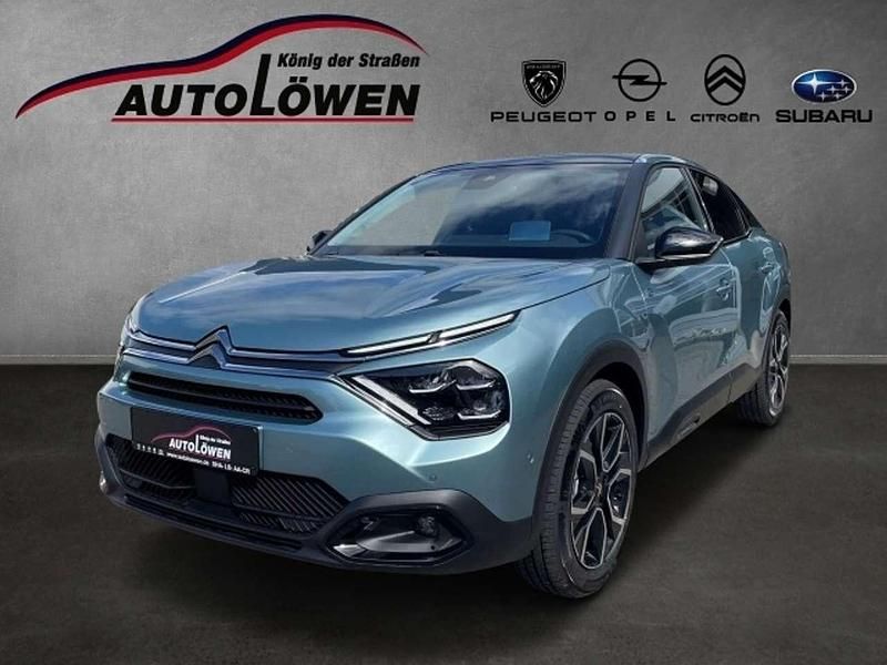 Islandblau (metalliclackieru Gebraucht 2023 Citroën e-C4 Shine Limousine | 21.349 € (Fairer Preis) - Bild 1/4