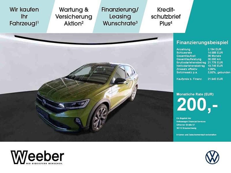 Visual green (metallic) Gebraucht 2022 VW Taigo Style SUV | 21.940 € (Guter Preis) - Bild 1/4
