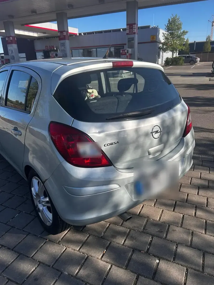 Second-hand Opel Corsa 90 CP (66 kW) 2009 Argintiu Hatchback