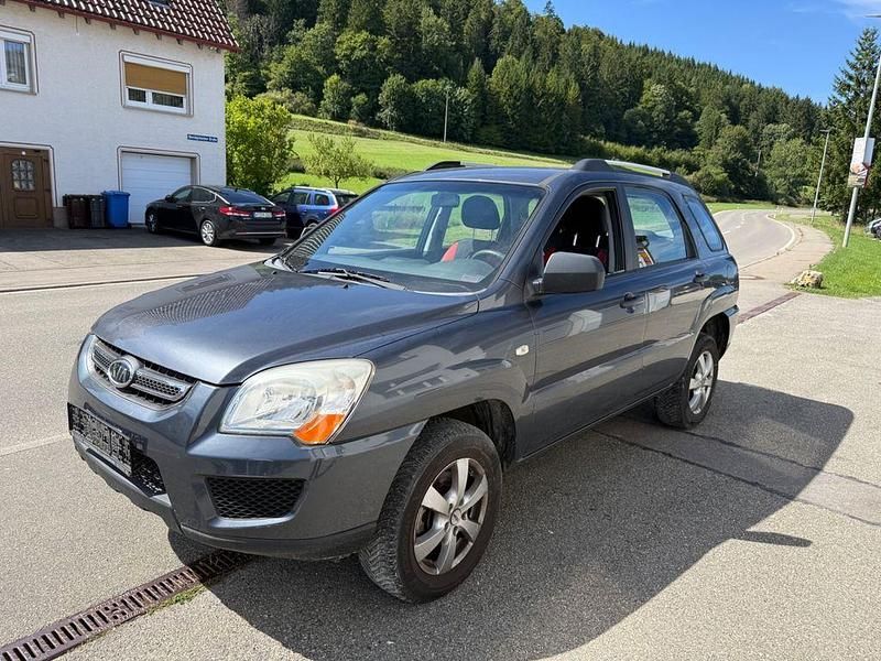 Grau Gebraucht 2009 Kia Sportage SUV | 3.200 € (Fairer Preis) - Bild 1/4