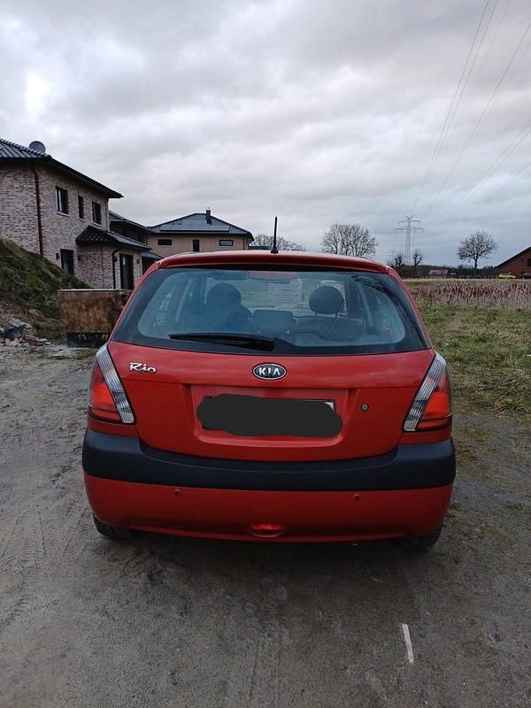 Używany Kia Rio EX 97 KM (71 kW) 2009 Czerwony Hatchback