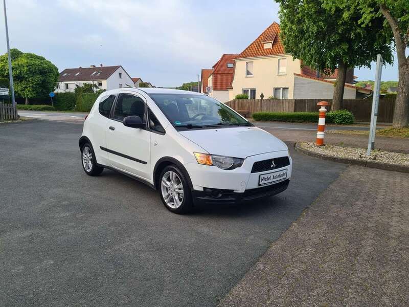 Porcelain white Gebraucht 2011 Mitsubishi Colt Edition Kleinwagen | 3.990 € (Fairer Preis) - Bild 1/4
