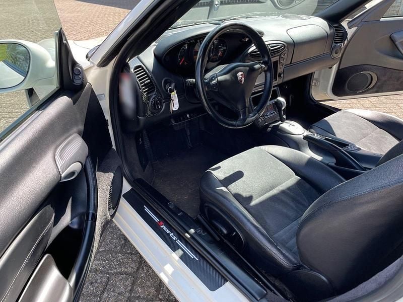 Second-hand Porsche Boxster 220 CP (161 kW) 2000 Alb Cabrio