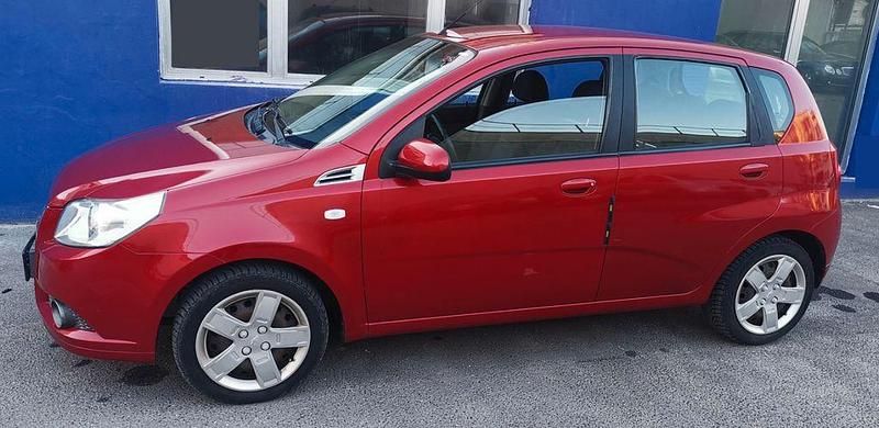 Gebraucht Chevrolet Aveo 84 PS (61 kW) 2011 Rot Limousine