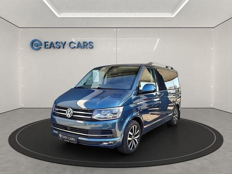 Second-hand VW Multivan Highline 199 CP (146 kW) 2019 Verde Monovolum