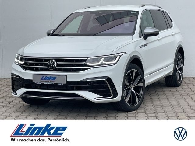 Pure white Gebraucht 2024 VW Tiguan Allspace R-line SUV | 52.490 € - Bild 1/4